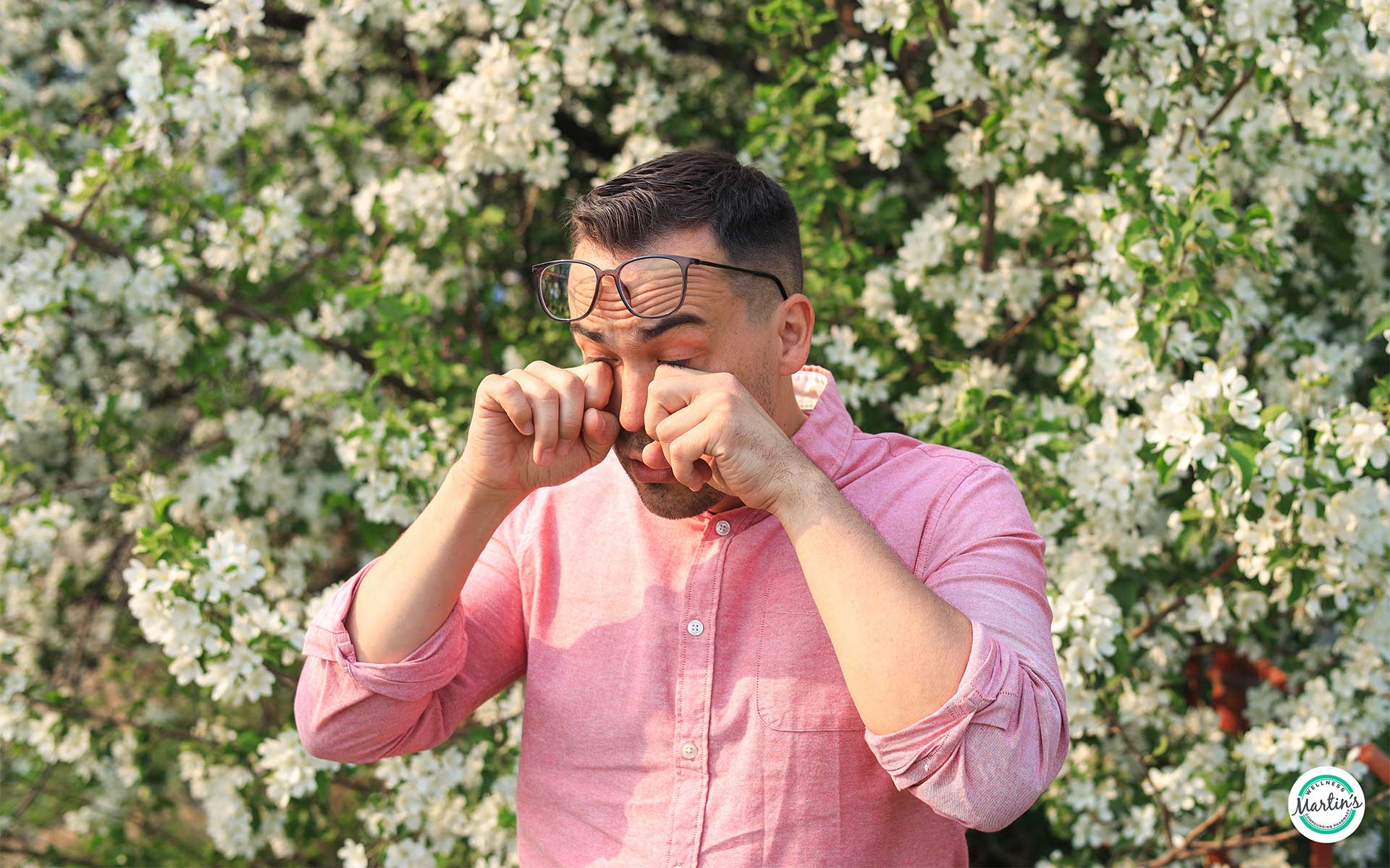 Man rubbing eyes from seasonal allergies needing natural supplement support