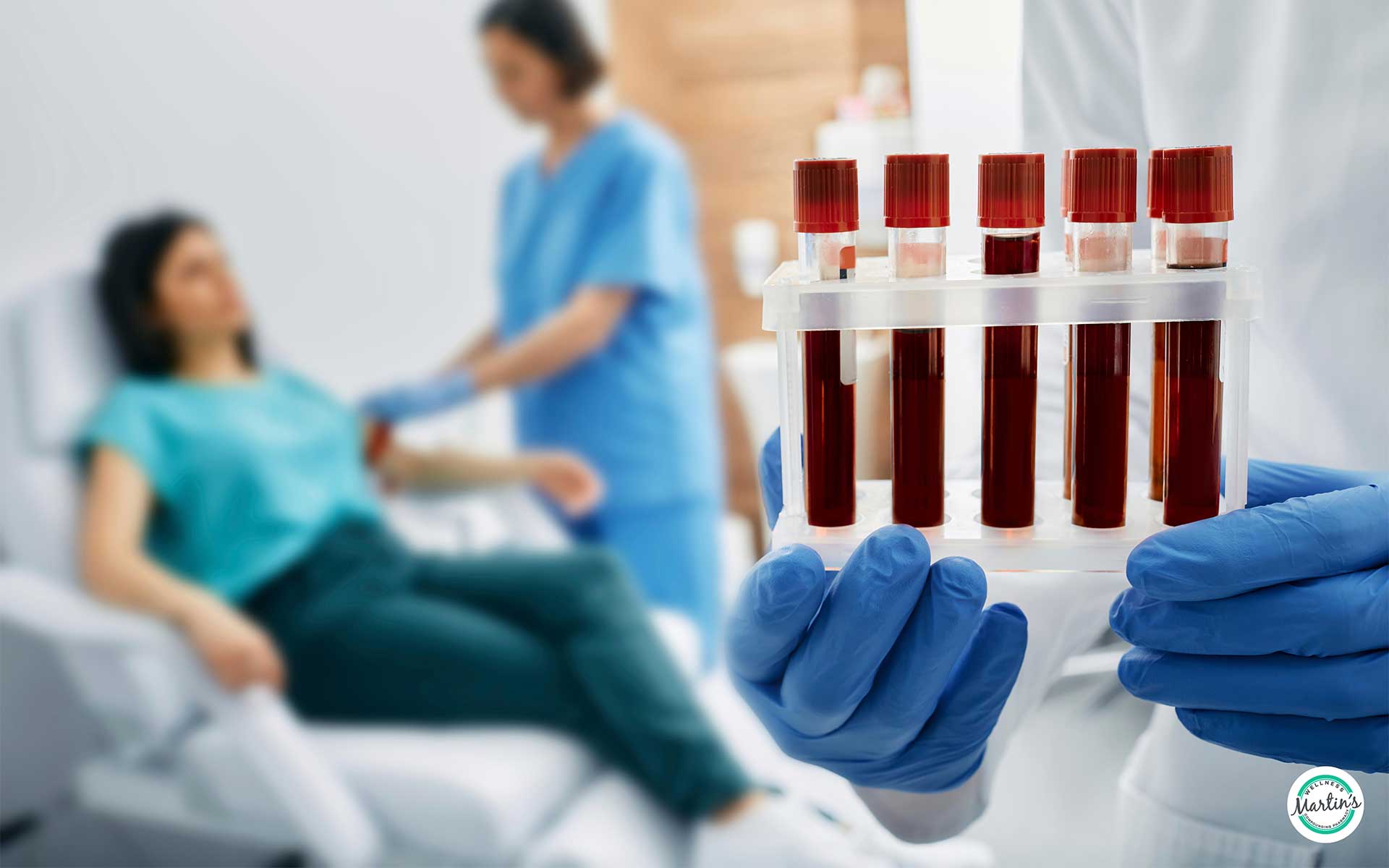 Blood samples for hormone testing with patient in background